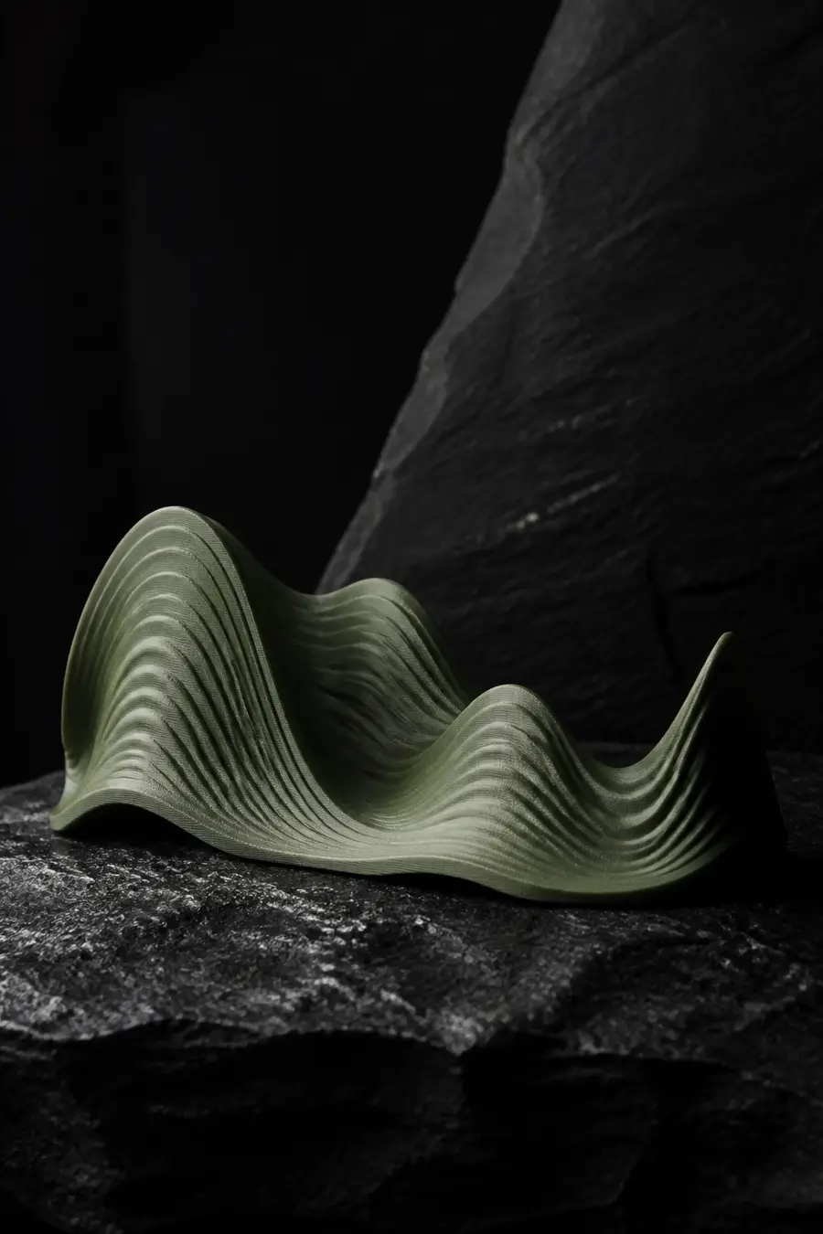 Wave sculpture on a studio surface